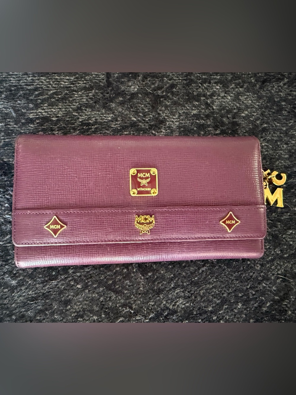 MCM Plum Saffiano Leather Wallet with Gold Emblems